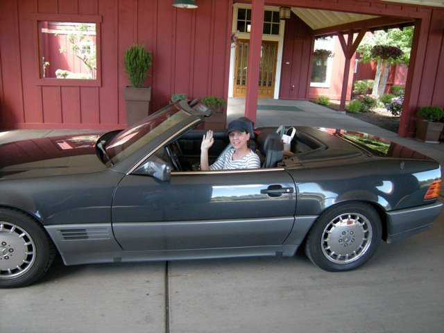Kyla in Mike's convertible a long time ago